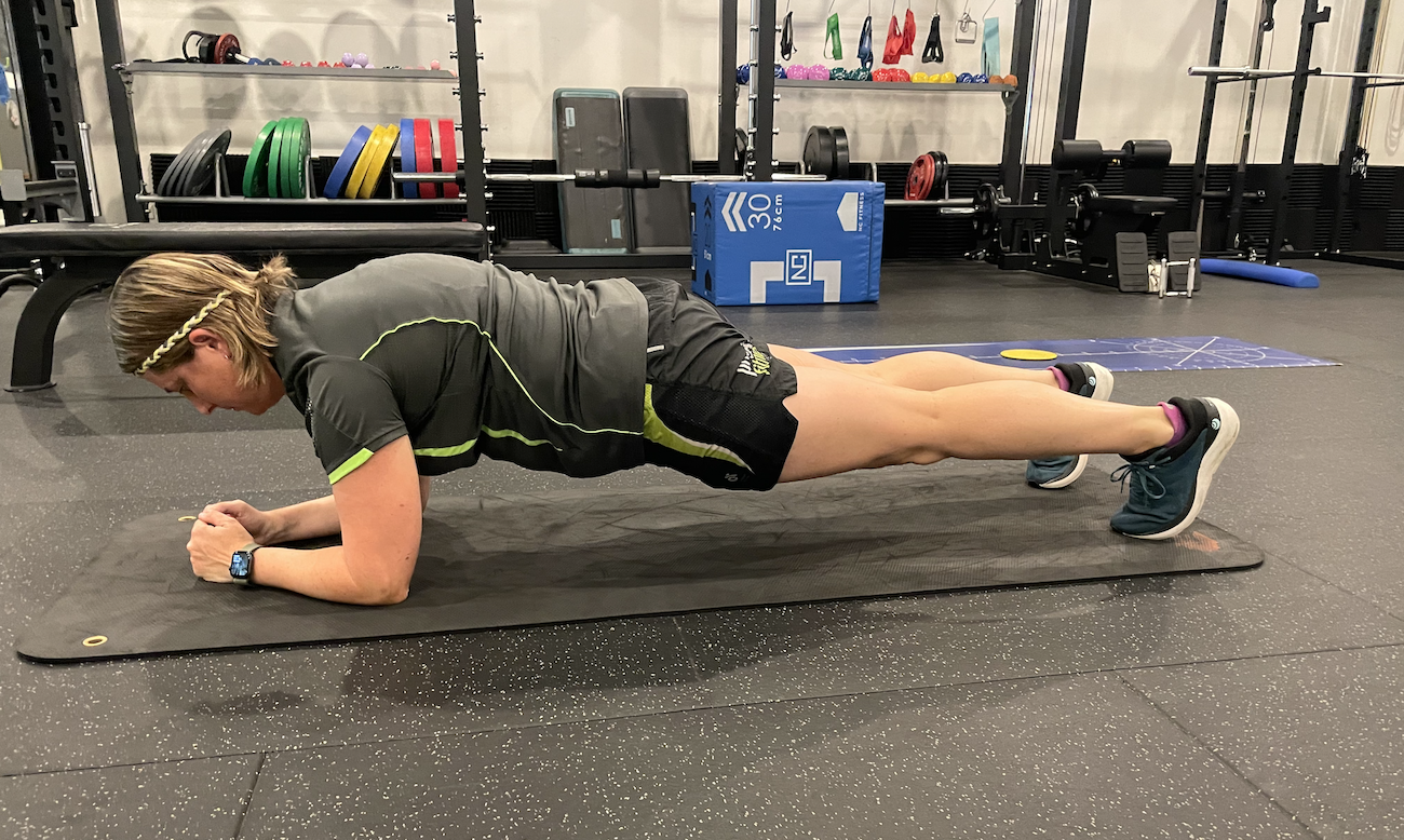 Start in a push-up position, with your palms flat on the ground and directly under your shoulders. Maintain a straight line from head to heels. Hold this position for 30 seconds to 1 minute, gradually increasing the duration as you progress. Variations include side planks and forearm planks.